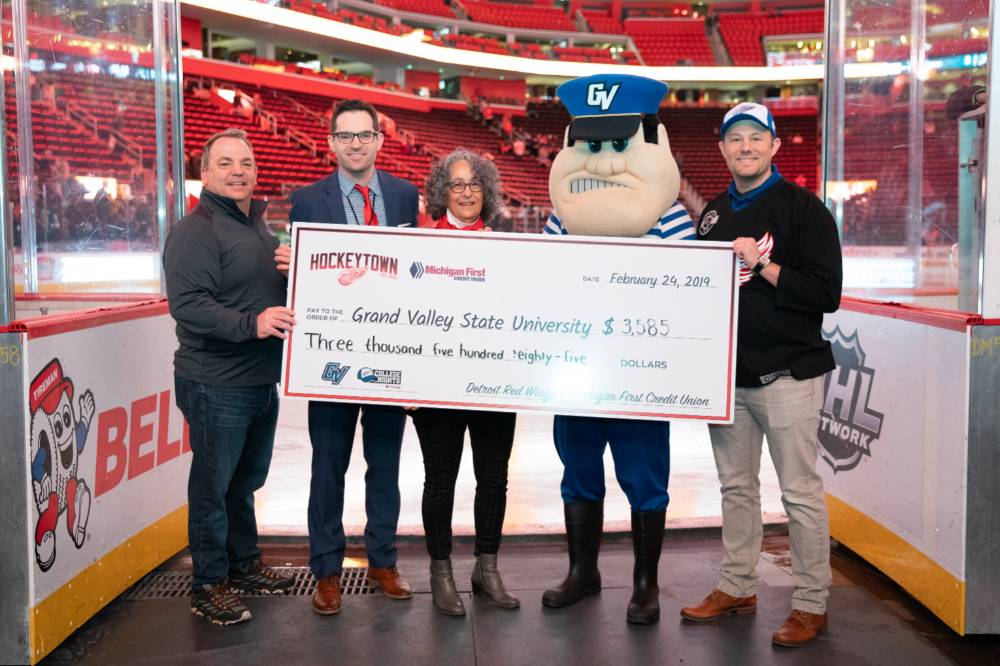 A photo displaying the amount that was raised for the GVSU Scholarship Fund at the Detroit Red Wings GVSU Night